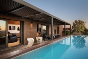 Casa Arbor Blanco with a see view and heated infinity pool